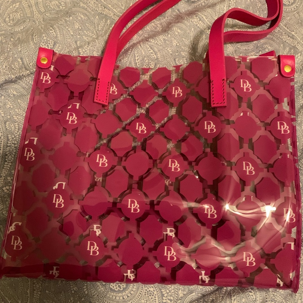Clear and pink dooney and bourke bag